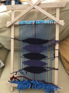 hand loom with warp and weft strung to create the Bowl